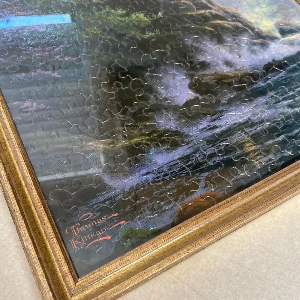 Framed Thomas Kinkade completed puzzle split rock light